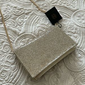 House of Harlow 1960 Golden Rhinestones covered clutch. New with tag.